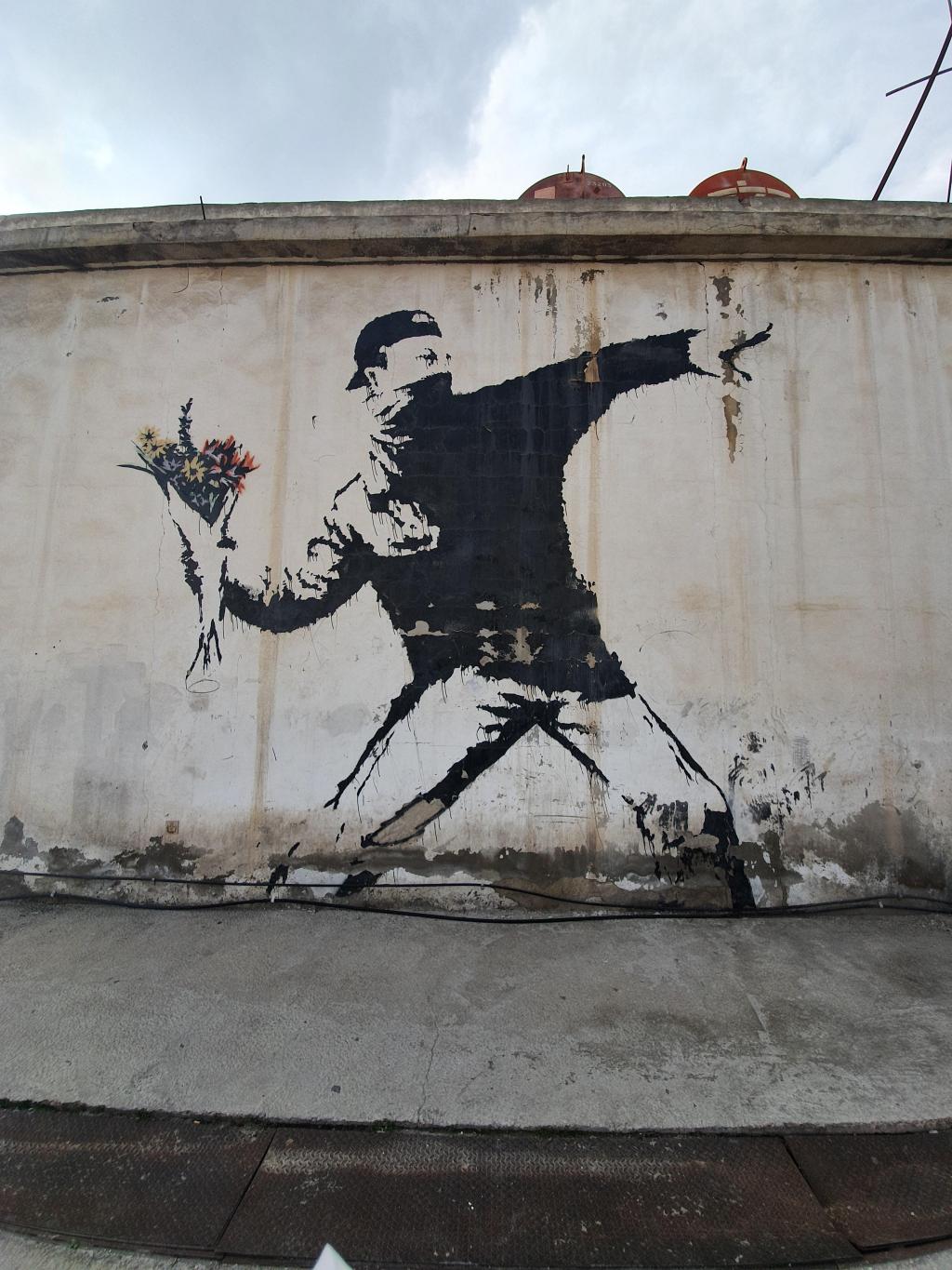Banksy: The Street Artist Redefining Art and Challenging Society