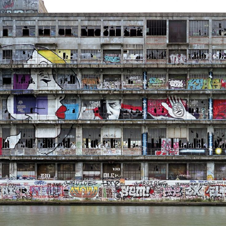 Unveiling the Artistic Underbelly: Graffiti-Covered Warehouses and Urban Exploration