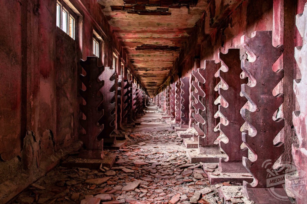 "Uncovering the Secrets of Decaying Factories: Exploring Forgotten Industrial Past"