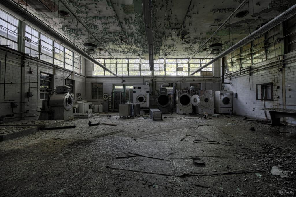 Uncovering the Forgotten Beauty: Exploring a Crumbling Laundry Facility Frozen in Time